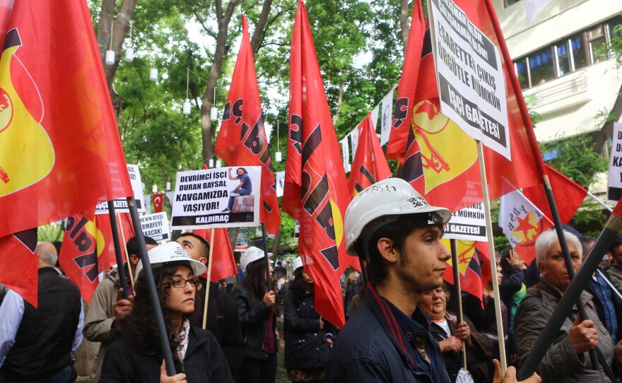 People take part in a march in memory of miners who died in an explosion at the Soma coal mine, on May 13 in Ankara, marking the second anniversary of a disaster that left 301 miners dead. U.S.-based cleric Fethullah Gulen is now being blamed for the tragedy.