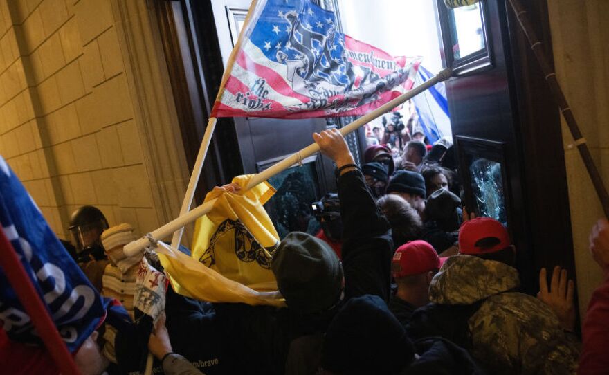 A pro-Trump mob breaks into the U.S. Capitol on Jan. 6, 2021, as Congress held a joint session to ratify President-elect Joe Biden's 306-232 Electoral College win over President Donald Trump.