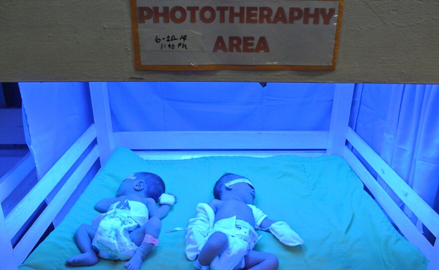 Babies under the blue light.
