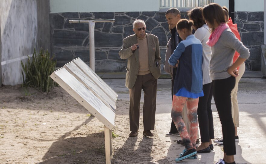 Kathrada (left), showed the Obama family around Robben Island on June 30, 2013. Kathrada chose to live on the island in his later years.