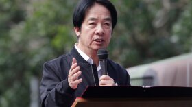 FILE - Taiwan President Lai Ching-te delivers a speech as he inspects Taiwanese reservists participating in reserve military training in Ilan County, Eastern Taiwan, Tuesday, Dec. 2, 2025.