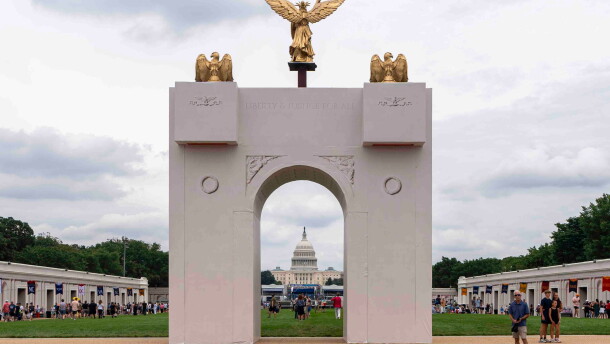 A mockup of President Donald Trump's proposed triumphal arch stands at the Great American State Fair on the National Mall, June 27, 2026, in Washington.