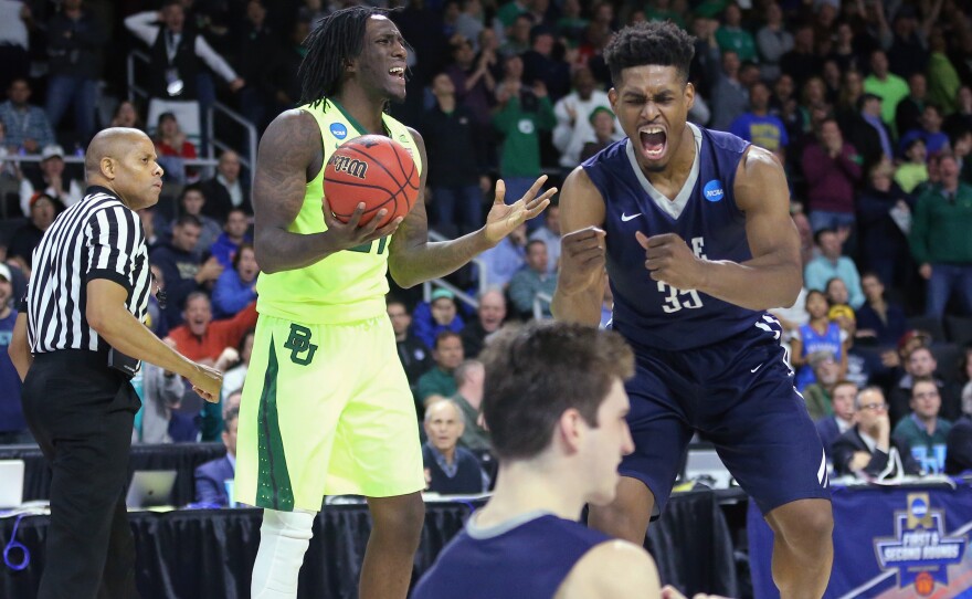 Taurean Prince (left) of the Baylor Bears explained rebounding after his team lost to Brandon Sherrod (right) of the Yale Bulldogs Thursday night, in the first round of the 2016 NCAA Men's Basketball Tournament.