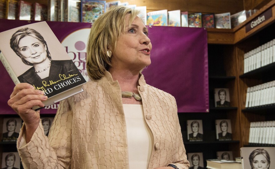 Hillary Clinton arrives to sign her book "Hards Choices" at a bookstore on Martha's Vineyard on August 13, 2014. According to the Clintons' 2015 tax returns, the couple earned $3.1 million from book advances and royalties.