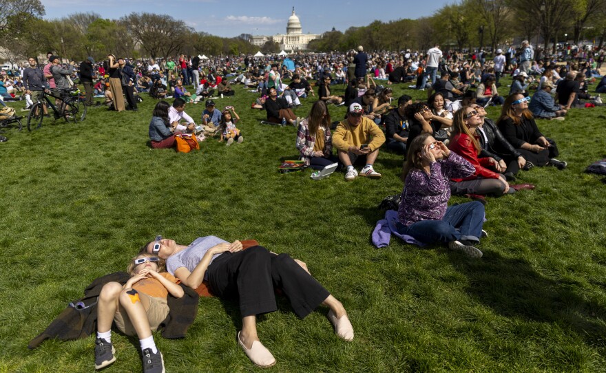 Thousands of people came to the National Mall in order to see the partial eclipse of the sun and to enjoy the Solar Eclipse Festival.