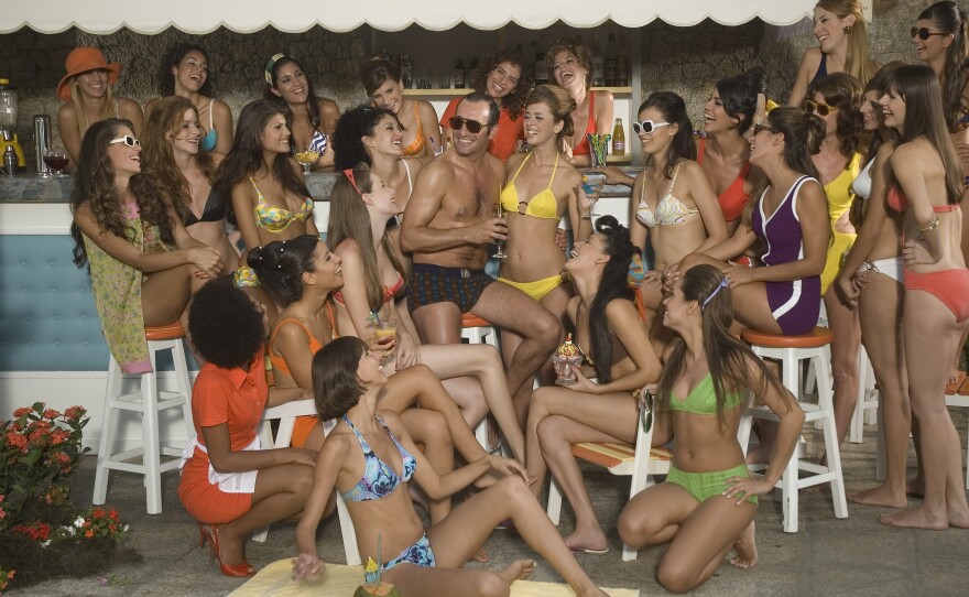 Jean Dujardin (center) and his bevy of beautiful babes.