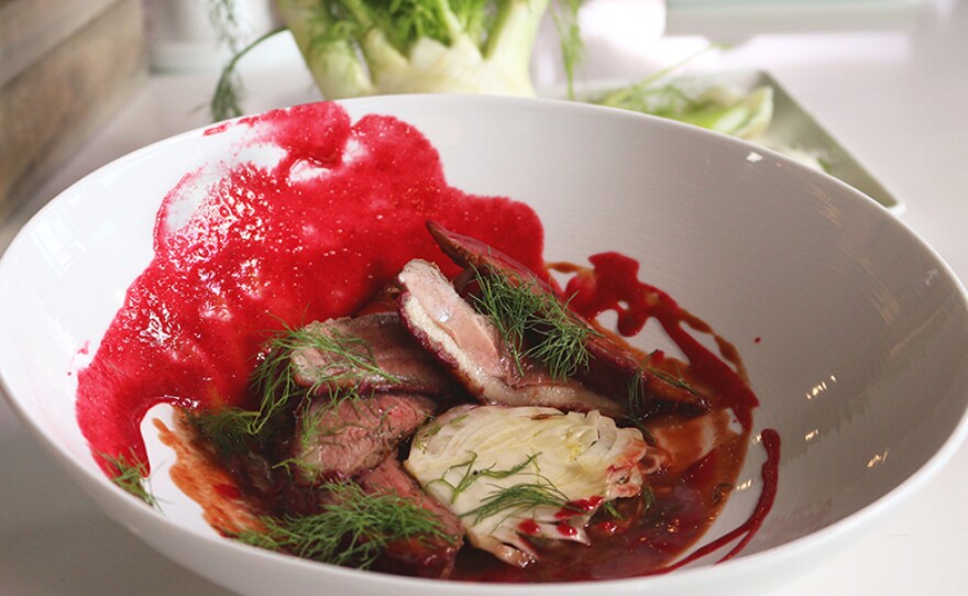 Acacia-glazed duck breast with with plum puree and shaved fennel salad from Chef Shaun Hergatt.