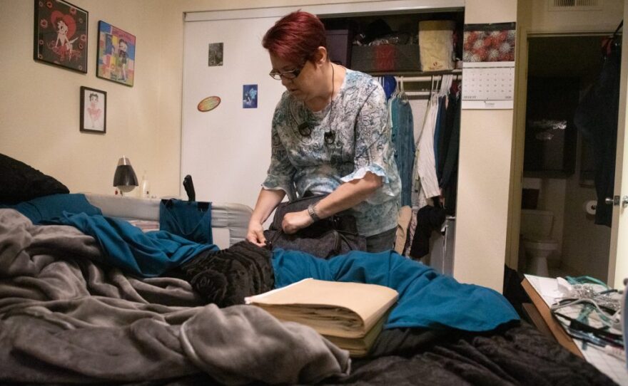 Army veteran AJ Williams packs a bag for her ketamine treatment at the VA Medical Center in La Jolla, Aug. 11, 2020. The treatments take from three to five hours.