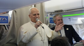 Pope Leo XIV talks to journalists aboard the papal flight from Rome to Madrid on June.