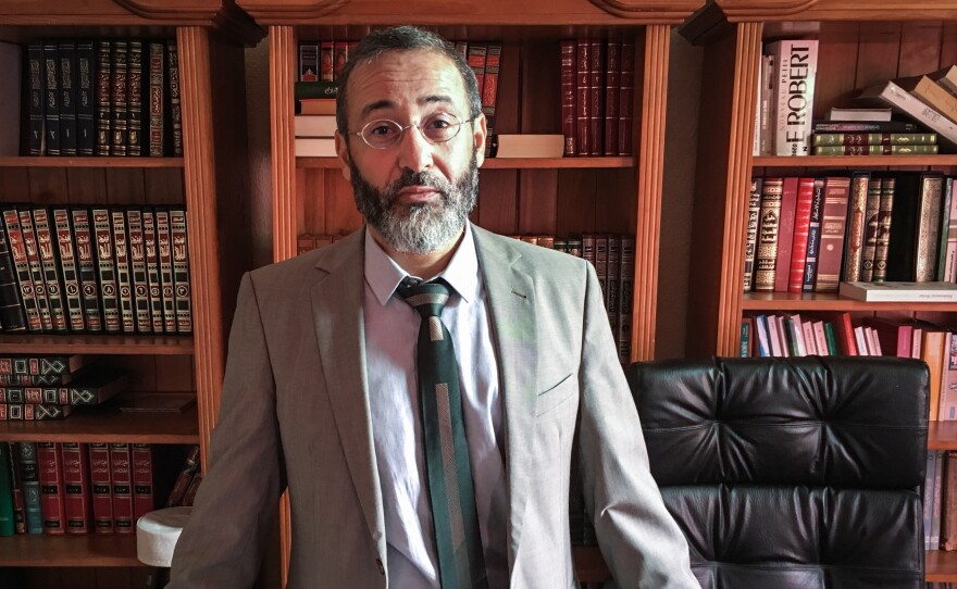 Tareq Oubrou has received death threats from radicals who disagree with his reform efforts, but has so far refused the French government's offer of protection. "Everyone in France feels threatened by terrorists," he says. "Why should I get protection?"