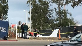 A small aircraft that crashed in Kearny Mesa is shown, Feb. 21, 2018. 