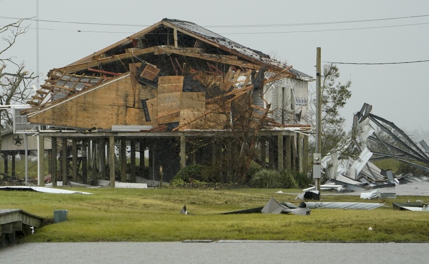 A home damaged by Hurricane Laura is seen Friday in Hackberry, La. Damage estimates from the storm range from around $4 billion to $12 billion.
