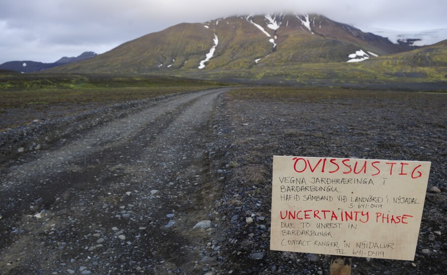 A warning sign blocks the road to Bardarbunga volcano, some 12 miles away, in the north-west region of Iceland's Vatnajokull glacier, on Tuesday.