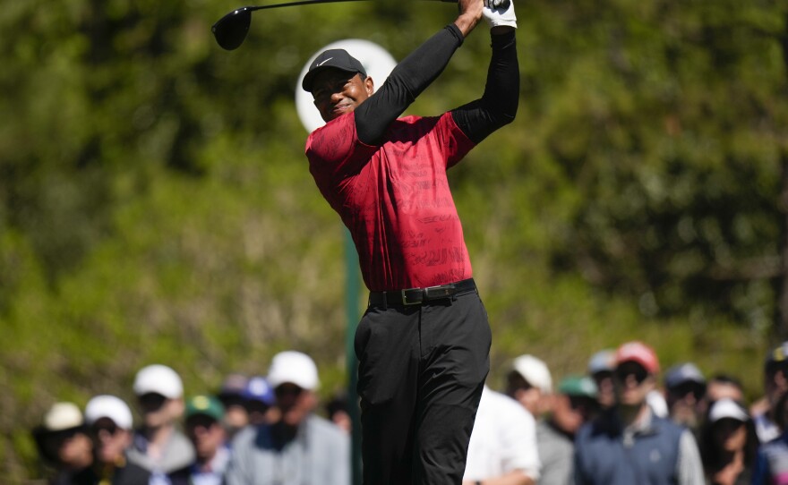 Tiger Woods tees off on the fifth hole during the final round at the Masters golf tournament on Sunday in Augusta, Ga.