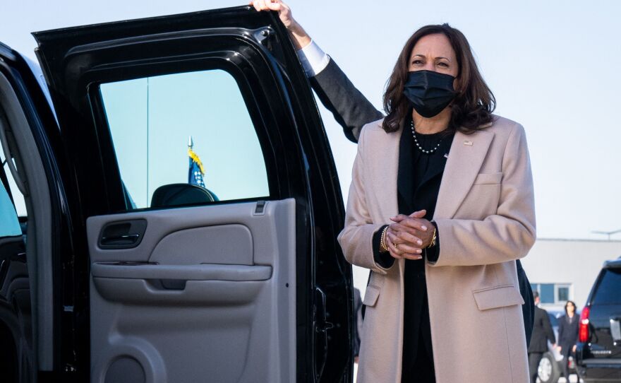 Vice President Harris speaks with reporters after landing in Paris on Nov. 9.