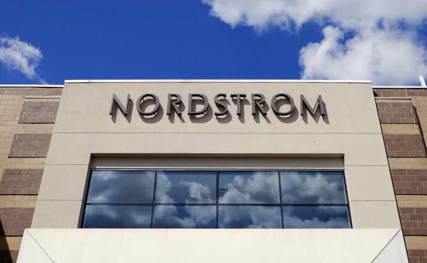A Nordstrom sign is displayed outside of a mall in 2017 in Indianapolis. Police described an "organized theft" at a Nordstrom near San Francisco.