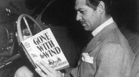 Margaret Mitchell's <em>Gone with the Wind</em> was at the center of Depression-era price-fixing controversies. Here, Clark Gable prepares for his role as Rhett Butler in the MGM film adaptation.
