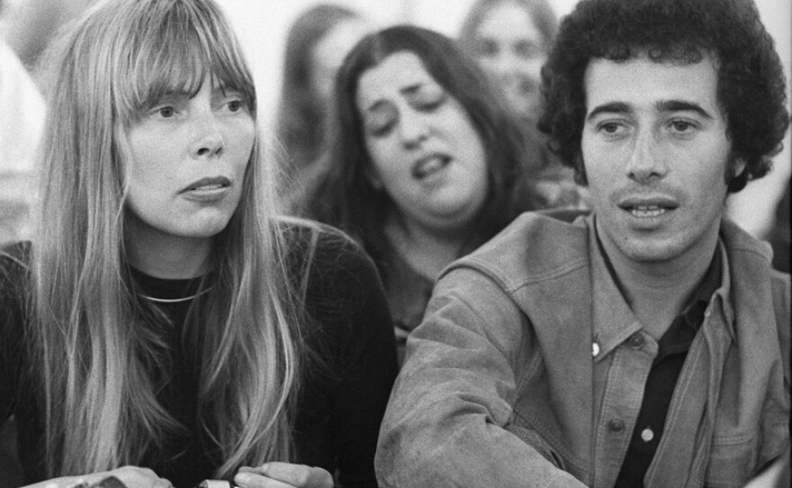 Joni Mitchell, Mama Cass (background), and David Geffen