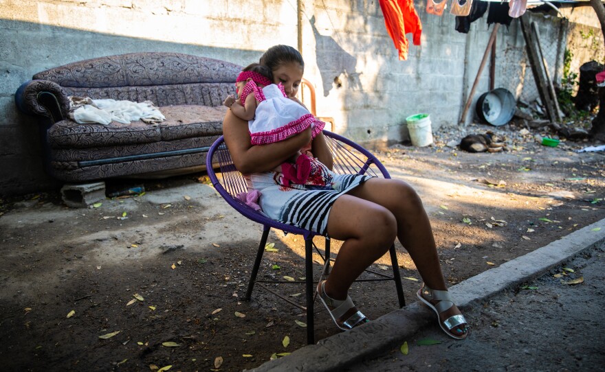 Cindi and her baby girl in San Pedro Sula. Her boyfriend Moises left the neighborhood a few months after she became pregnant. Cindi sent photos of the baby to Moises via WhatsApp. But a few weeks ago, he stopped responding to her texts, which worries Cindi. She hopes that Moises is OK and that she will hear from him again soon.