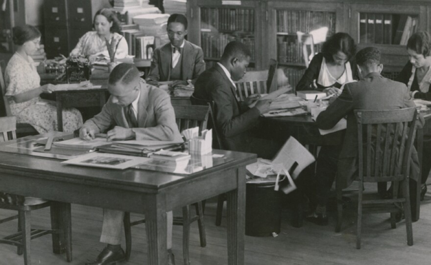 Researchers at the constructed-by-Carnegie 135th Street branch of the New York Public Library, 1938.