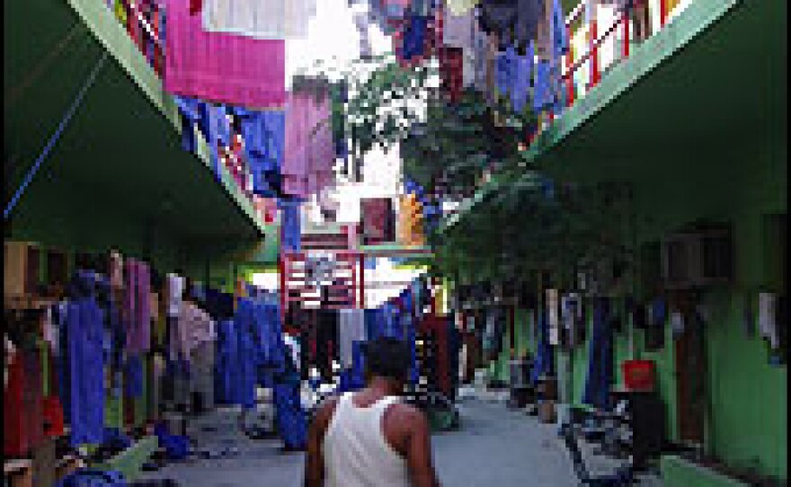Blue uniforms hang to dry at one of the labor camps in Dubai, a city in the United Arab Emirates. Because of their inability to form labor unions, foreign workers who make up 95 percent of the country's labor pool are vulnerable to exploitation, according to Human Rights Watch.