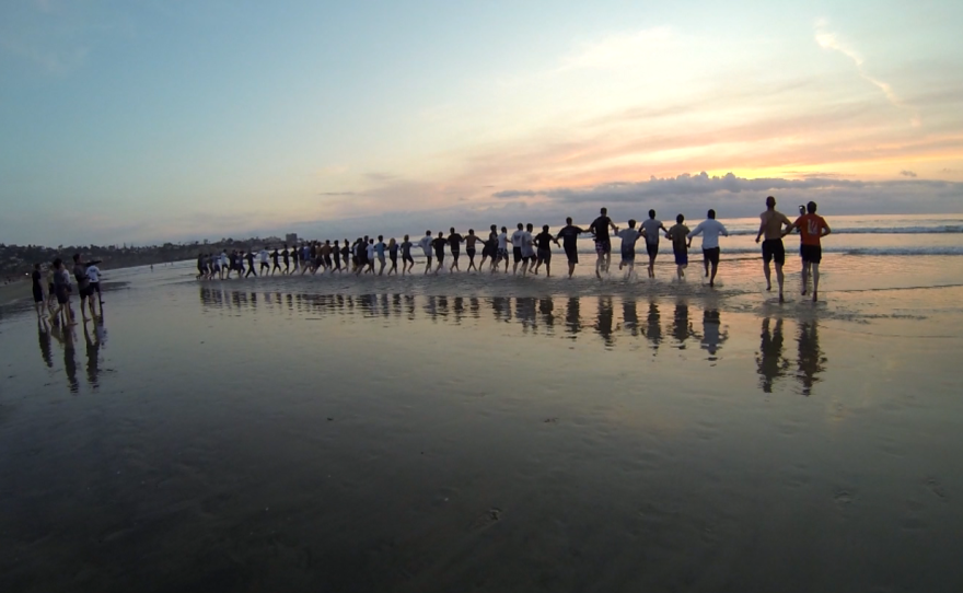 Students in a Krav Maga class enter the ocean at La Jolla Shores for instruction on defending an attack in the water, April 22, 2015.