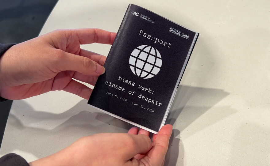 Digital Gym Cinema Associate Laurie Piña holds the passport attendees will receive at Bleak Week on June 2, 2026.