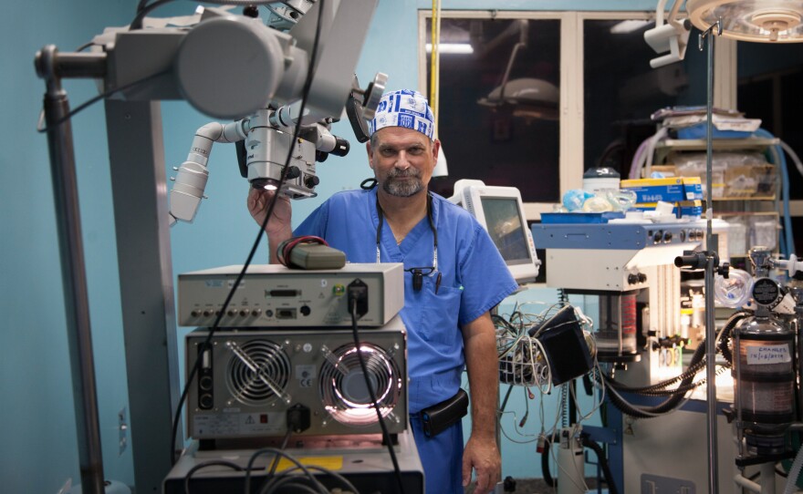 Dr. Michael Haglund stands in an operating theater at Mulago National Referral Hospital in Kampala, Uganda, in 2014. Haglund, the founder of Duke Global Neurosurgery and Neurology, had been traveling to Uganda to perform brain surgeries twice a year since 2007 – until the pandemic hit.