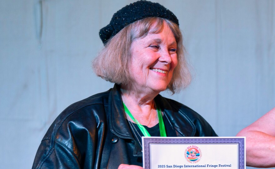 Beth Accomando gave her Fringe Geek Award to Kata Pierce-Morgan for creating the new 49th and Logan Cultural Complex where there were two Fringe venues. May 25, 2025