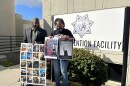 Yusef Miller (left) stands alongside fellow activist Cheryl Canson outside of the Vista Detention Facility on Dec. 1, 2023.