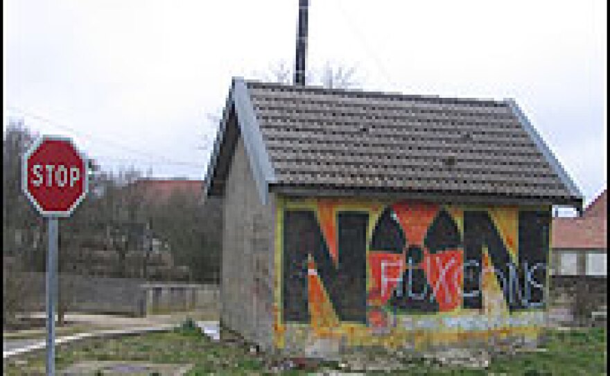 Anti-nuclear graffiti decorates a small building in Bure, a town that will likely be the site of France's nuclear waste burial site.