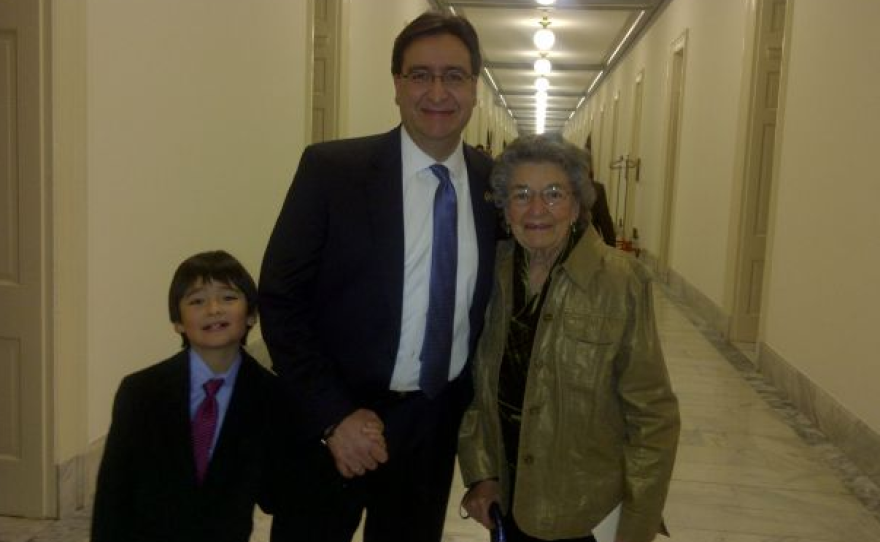 U.S. Rep. Pete Gallego (D-Texas) walks with his mother and his son to the swearing-in ceremony of the 113th U.S. Congress on Thursday.