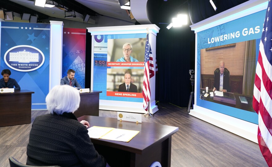 Treasury Secretary Janet Yellen, left, listens as President Joe Biden speaks virtually during a meeting with his economic team in the South Court Auditorium on the White House complex in Washington on Friday.
