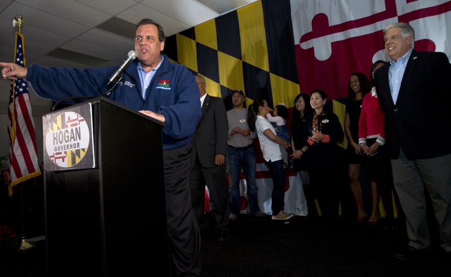 New Jersey Republican Governor Chris Christie, left, speaks during a campaign rally in support of Republican gubernatorial candidate Larry Hogan, right, in Baltimore, Md.