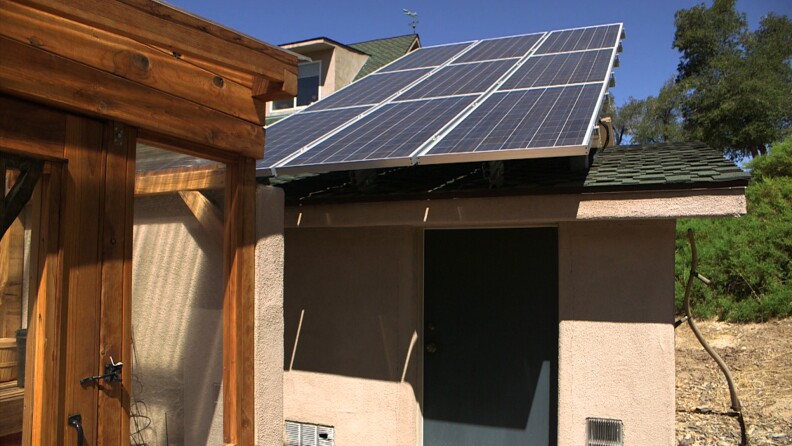Nine solar panels provide all of the electricity to the Waayers' Cuyamaca Woods home. They store reserve power in batteries and have a propane backup generator for multiple cloudy days, Sept. 19, 2014.
