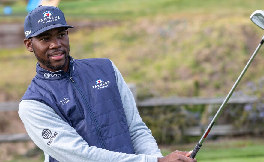 Kamaiu Johnson practices ahead of his PGA Tour debut on Thursday at legendary Pebble Beach. Johnson, 27, was discovered by a golf pro at age 13 after he had dropped out of school.
