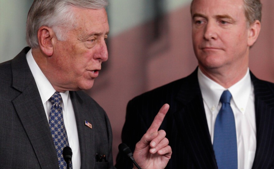 House Minority Whip Steny Hoyer answers reporters' questions about the House's inability to pass a payroll tax cut extension. At right is Democratic Rep. Chris Van Hollen of Maryland.