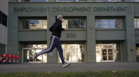 California reported a significant surge in unemployment claims this year for independent contractors, accounting for more than a quarter of all such claims nationally and raising concerns about widespread fraud. Above, a runner passes the office of California's Employment Development Department in Sacramento in December.