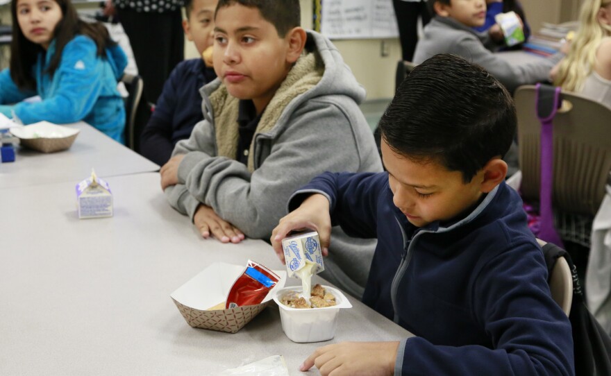 Students are served breakfast at the Stanley Mosk Elementary School in Los Angeles, April 8, 2015.