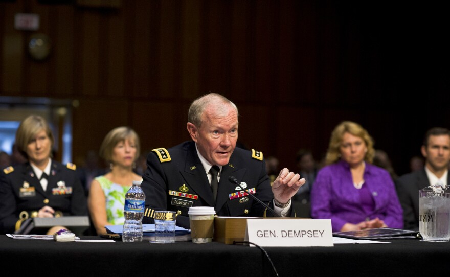 Army Gen. Martin E. Dempsey, chairman of the Joint Chiefs of Staff, testifies on his nomination to serve a second two-year term during a hearing before the Senate Armed Services Committee in Washington, July 18, 2013. 