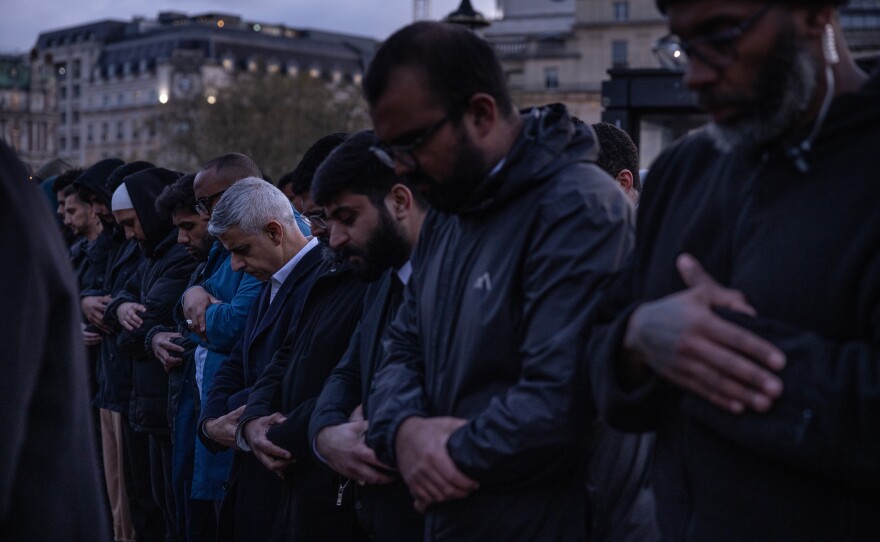 Muslims including London Mayor Sadiq Khan pray as they gather in Trafalgar Square for an open iftar event on April 20, 2023, in London.