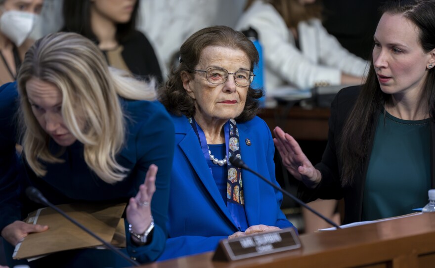 Sen. Dianne Feinstein, D-Calif., is flanked by aides as she returns to the Senate Judiciary Committee following a more than two-month absence as she was being treated for a case of shingles, at the Capitol in Washington, Thursday, May 11, 2023. Senate Judiciary Committee Chairman Dick Durbin, D-Ill., has been delayed in advancing many of President Joe Biden's judicial nominees because of the 89-year-old Feinstein's absence.