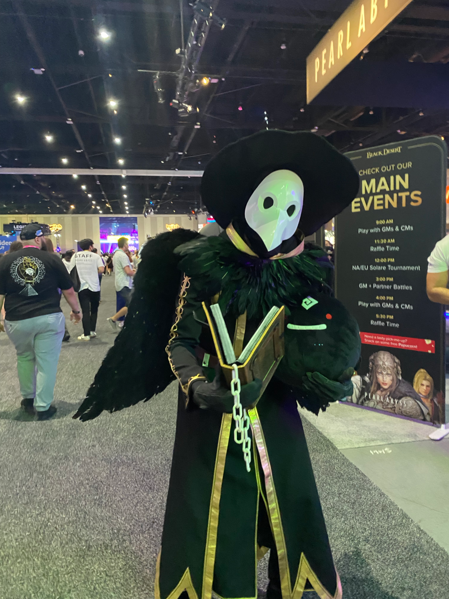 A TwitchCon attendee cosplays as a plague doctor. San Diego Convention Center. Oct. 7, 2022.