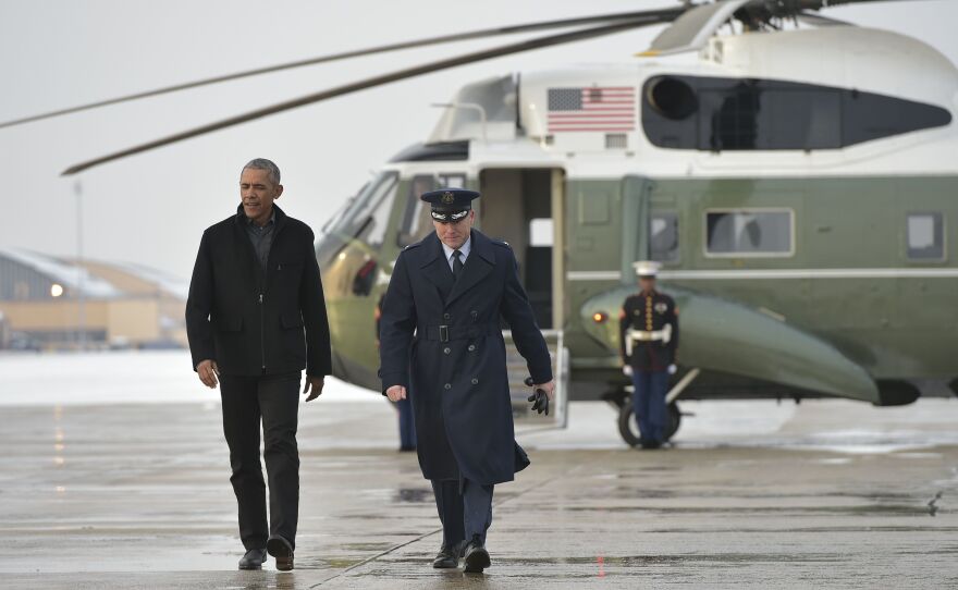President Obama, seen on his way to board Air Force One, will deliver his farewell address on Tuesday night in Chicago.