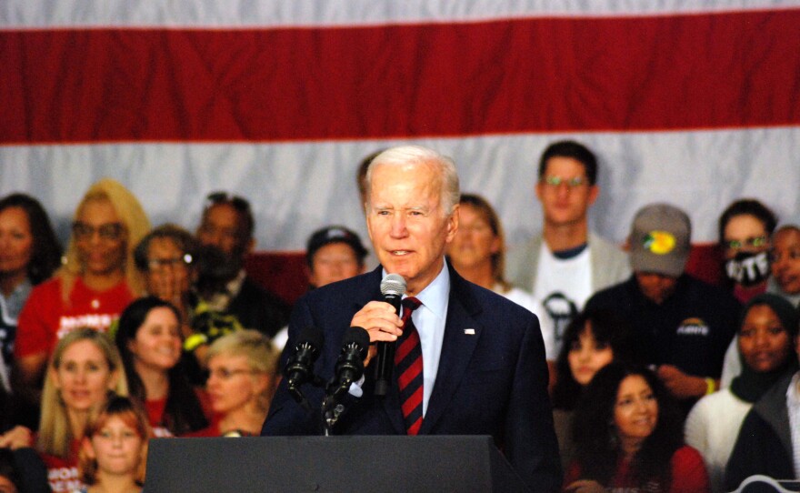 President Joe Biden takes the stage at Mira Costa College in Oceanside to campaign for Mike Levin on Nov. 3, 2022.