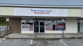 Campaign signs fill the windows of the Aroostook County Republican campaign headquarters in Caribou, Maine.