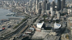 The Alaskan Way Viaduct, the raised two-level highway that runs along Seattle's downtown waterfront, is seen from the air in 2006. Seattle is now replacing it to improve mobility for people and goods.