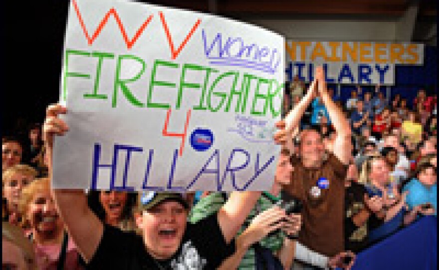 Supporters cheer as Clinton is announced as the projected winner of the West Virginia primary.