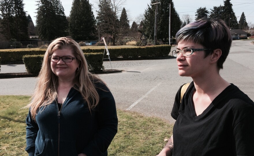 La Rae deQuilettes, left, is trying to locate her husband Ron, who is among the missing after a massive mudslide. Their oldest daughter, Ashlee Straub, is at right.