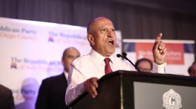 Escondido incumbent Mayor Sam Abed speaks at the podium at The U.S. Grant Hotel in San Diego, Nov. 6, 2018. 